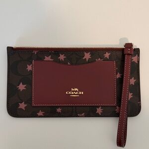 Coach Burgundy and Pink Star Print Zip Wristlet